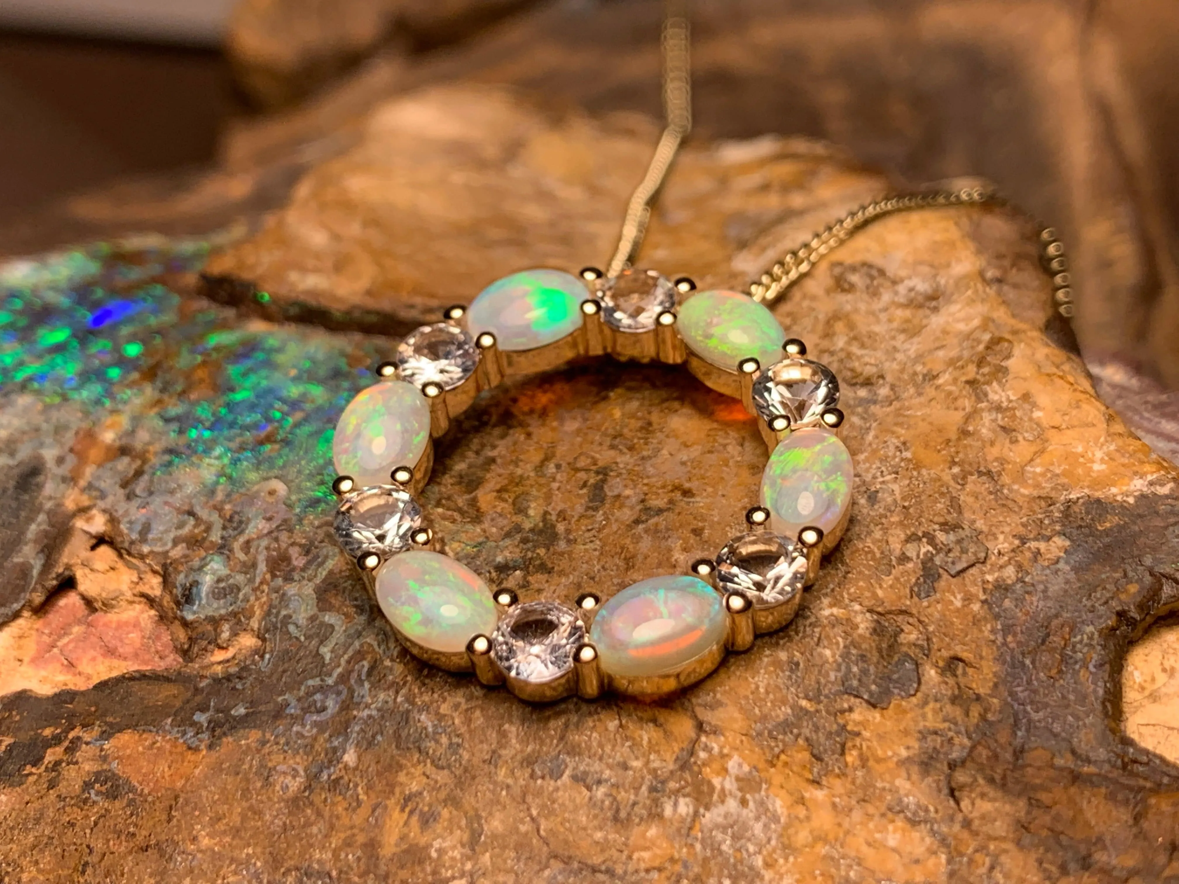 14kt Yellow Gold Circle of Life Opal and Sapphire pendant