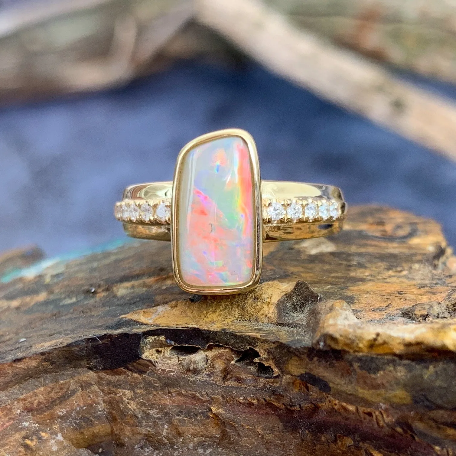 14kt Yellow Gold rectangular Fire Light Opal with diamonds ring