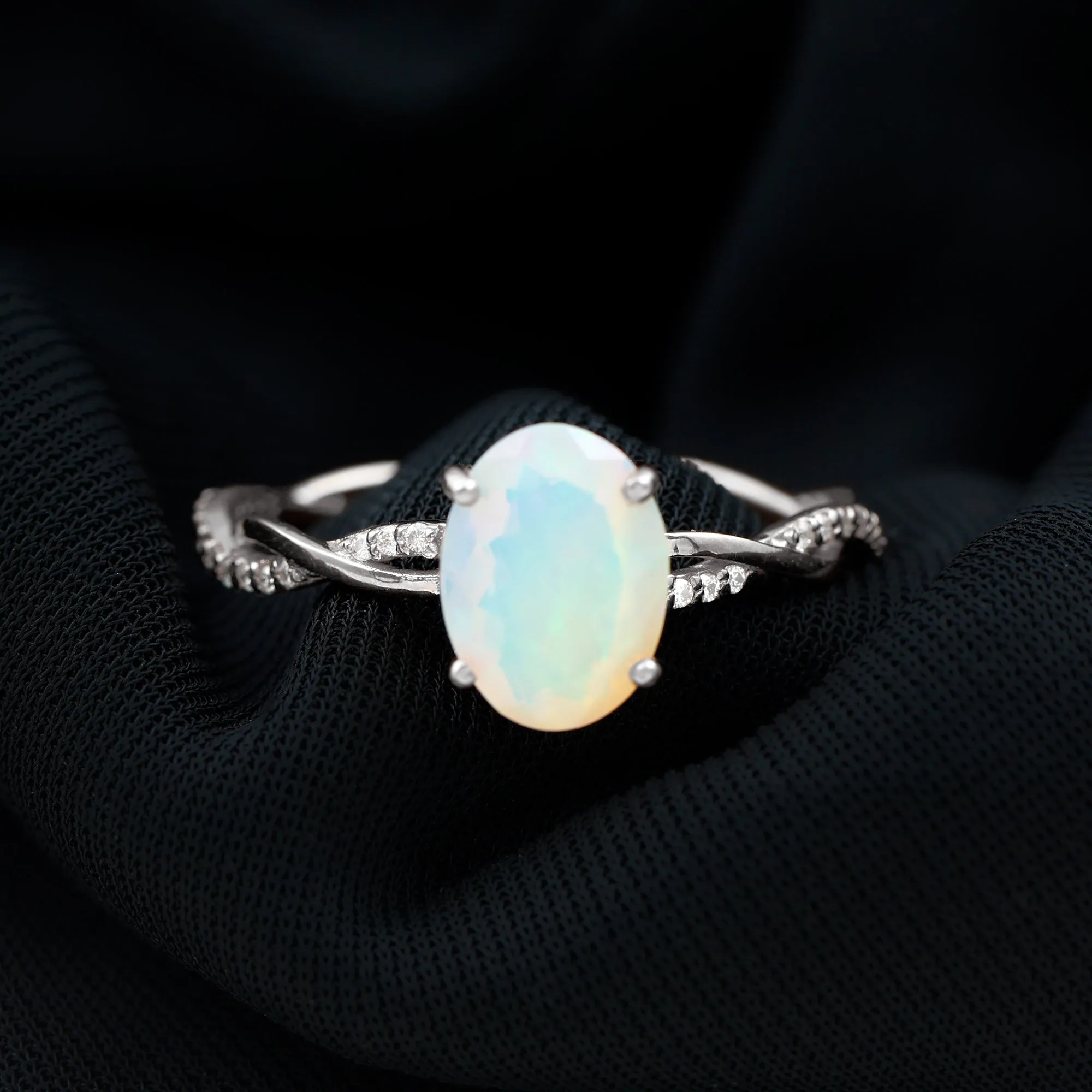 1.5 CT Oval Ethiopian Opal and Diamond Braided Ring