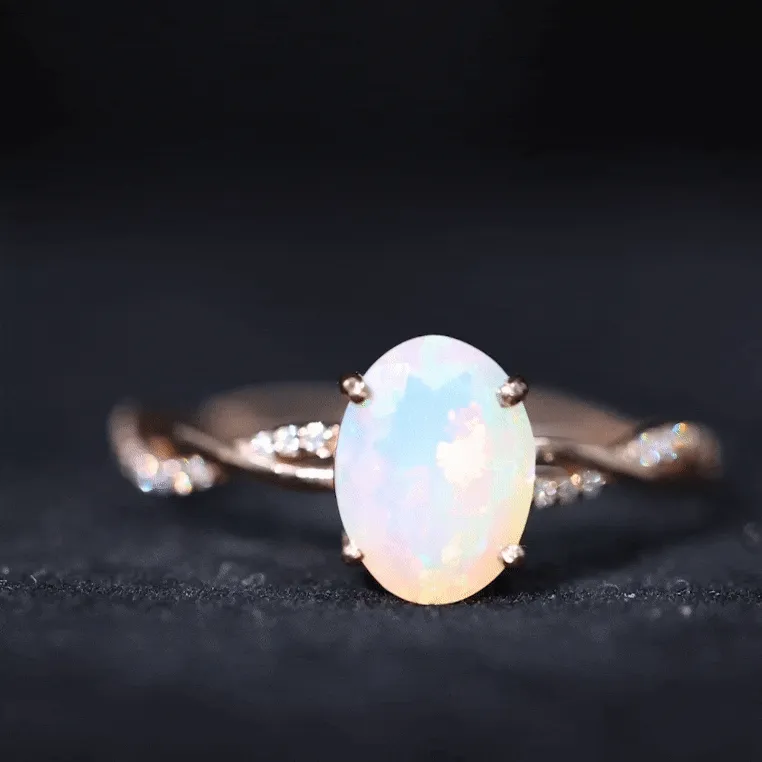 1.5 CT Oval Ethiopian Opal and Diamond Braided Ring