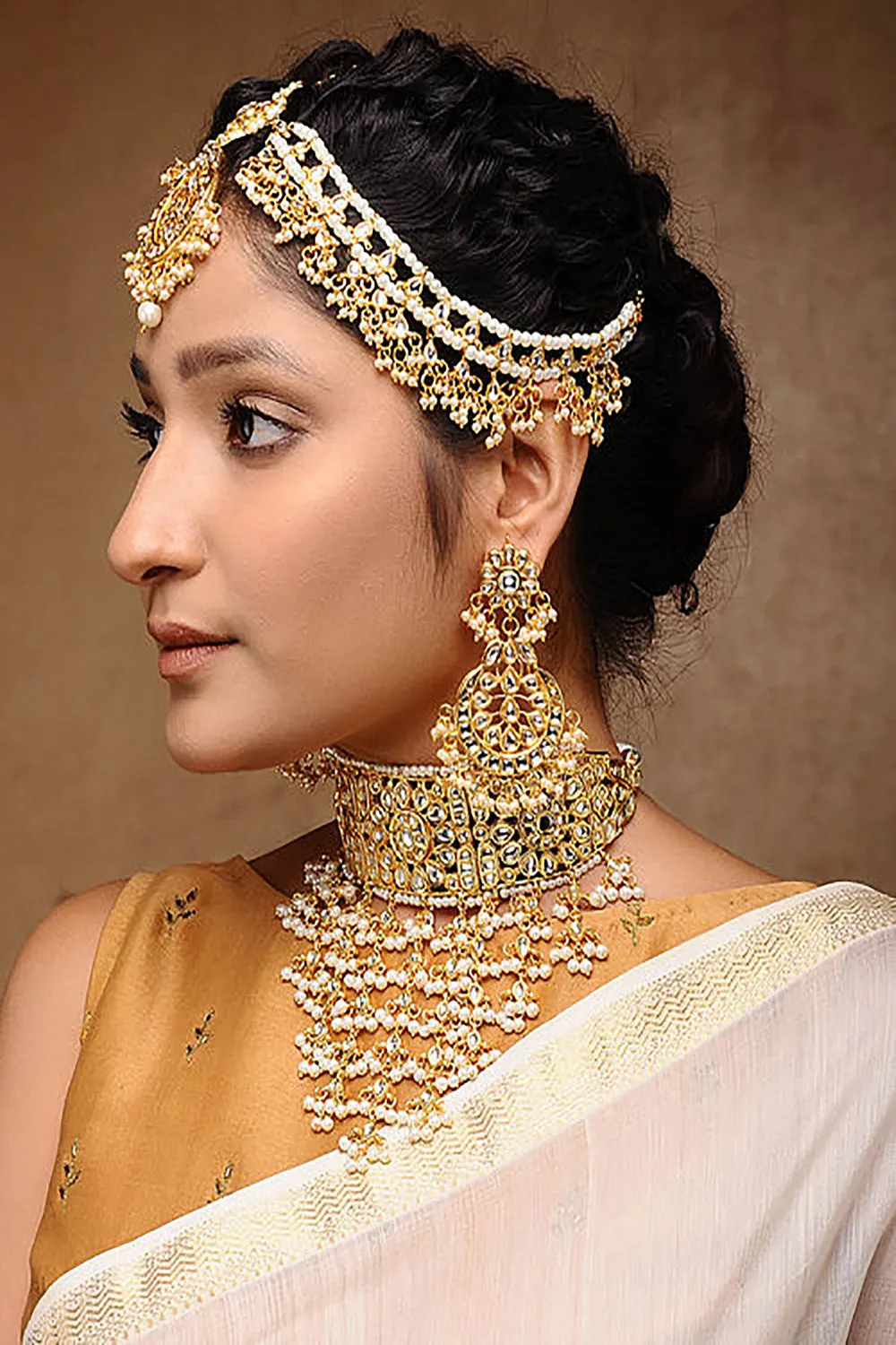 Alloy Kundan Maharani Set with Matha Patti in Gold and White