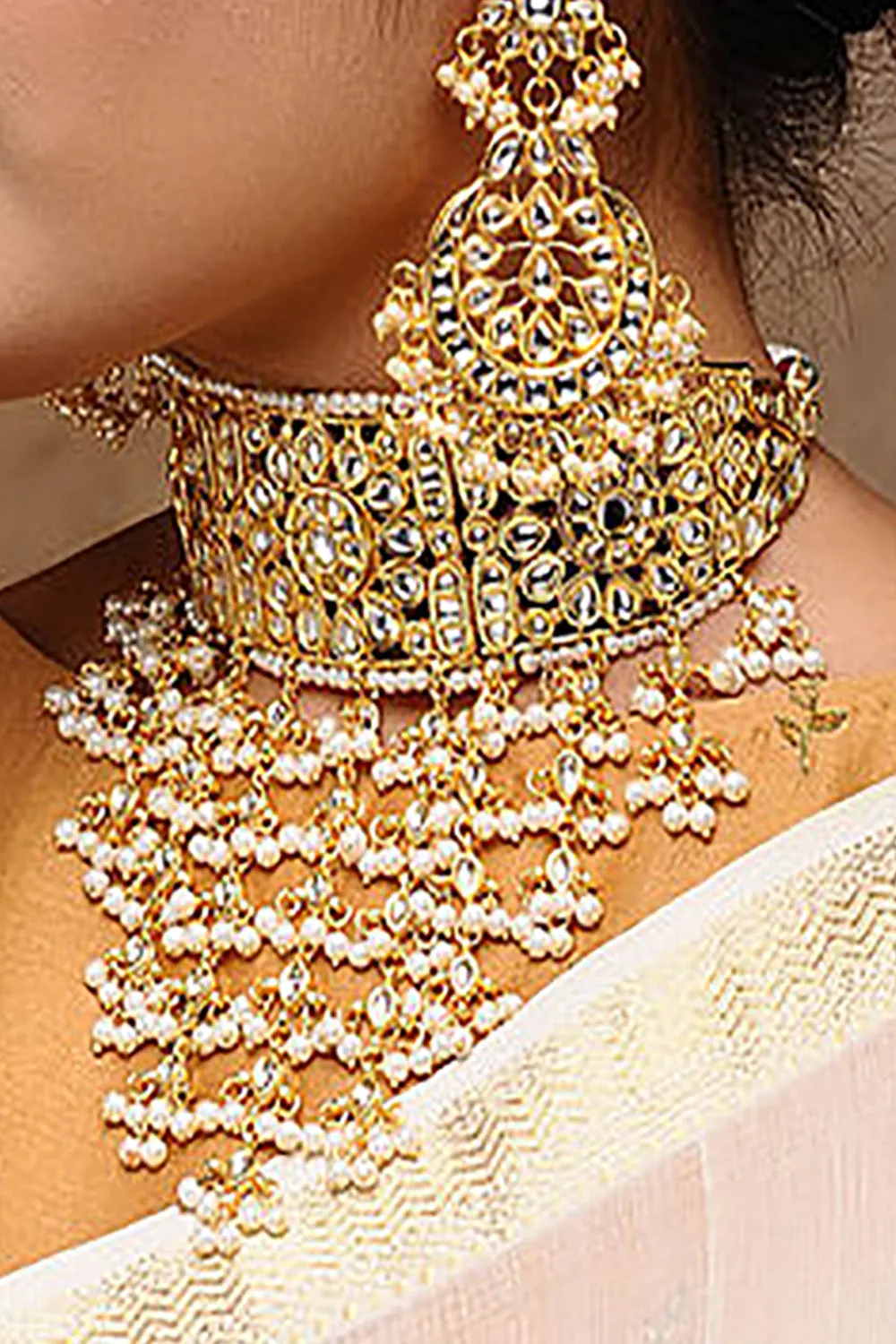 Alloy Kundan Maharani Set with Matha Patti in Gold and White