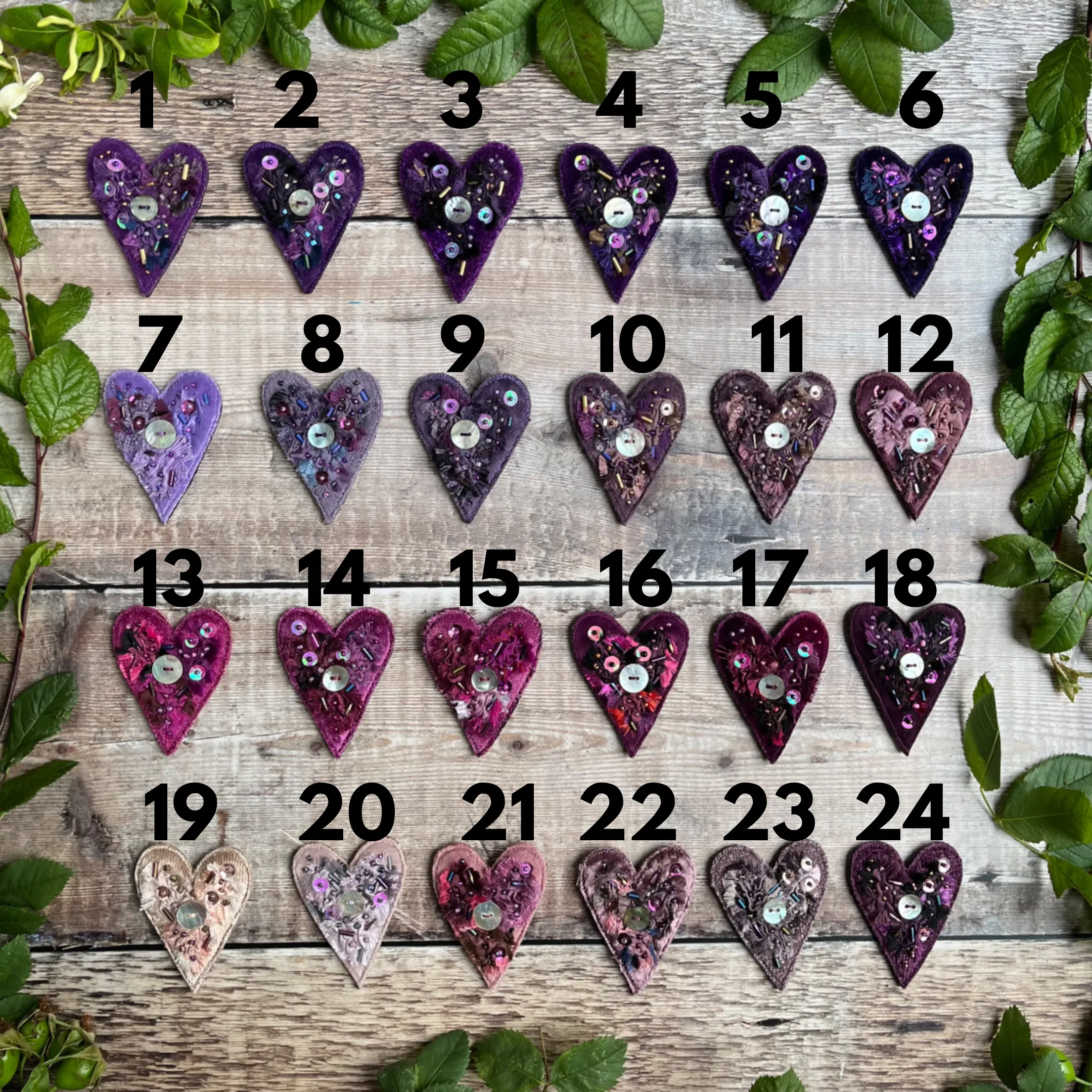 Fabric heart brooches in purples