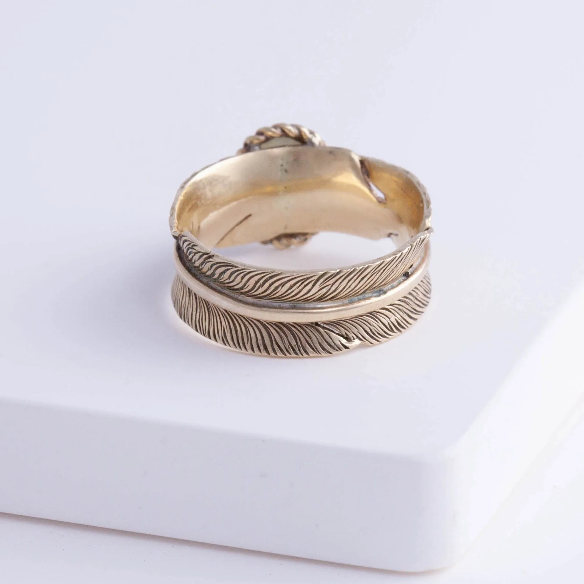 Gold large infinity feather ring with Ethiopian opal