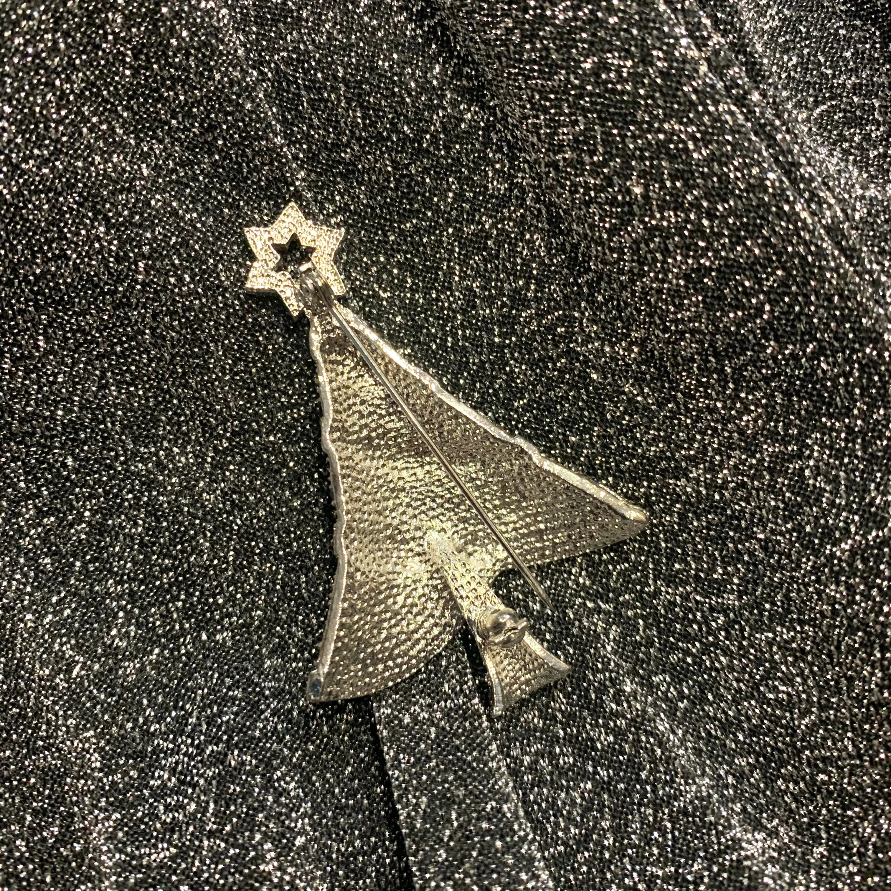 Icy Blue Christmas tree brooch with a star in gold tone.
