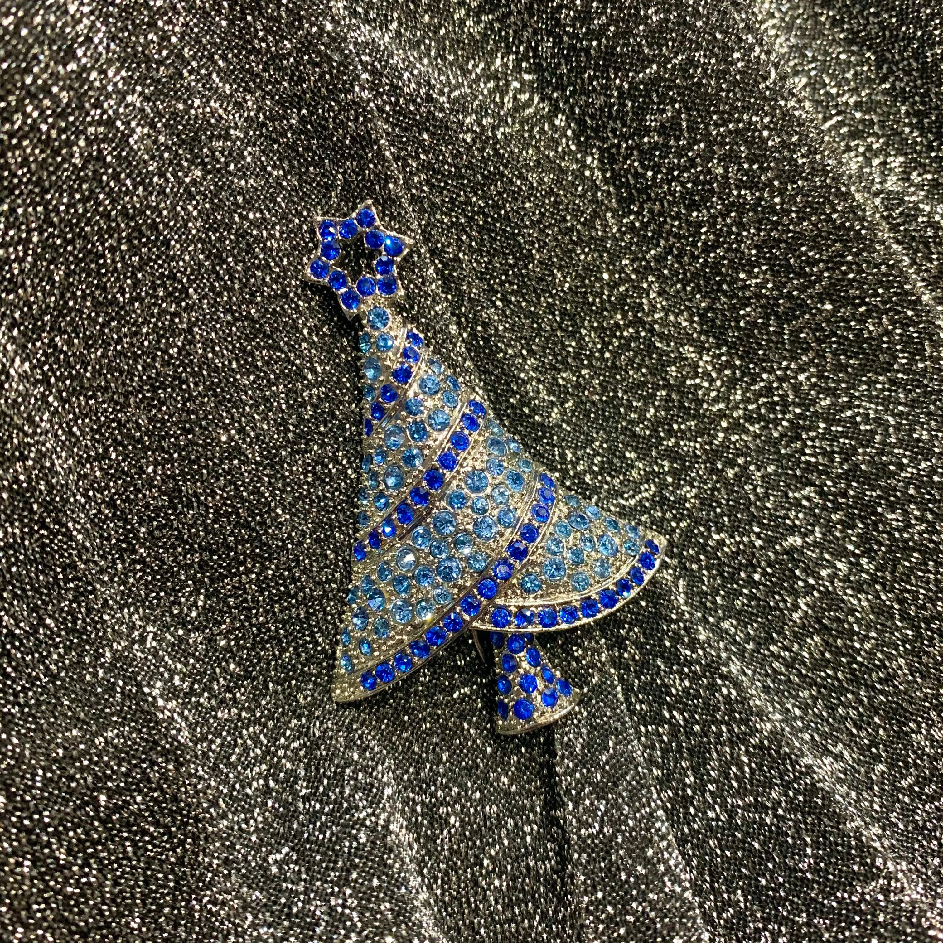 Icy Blue Christmas tree brooch with a star in gold tone.