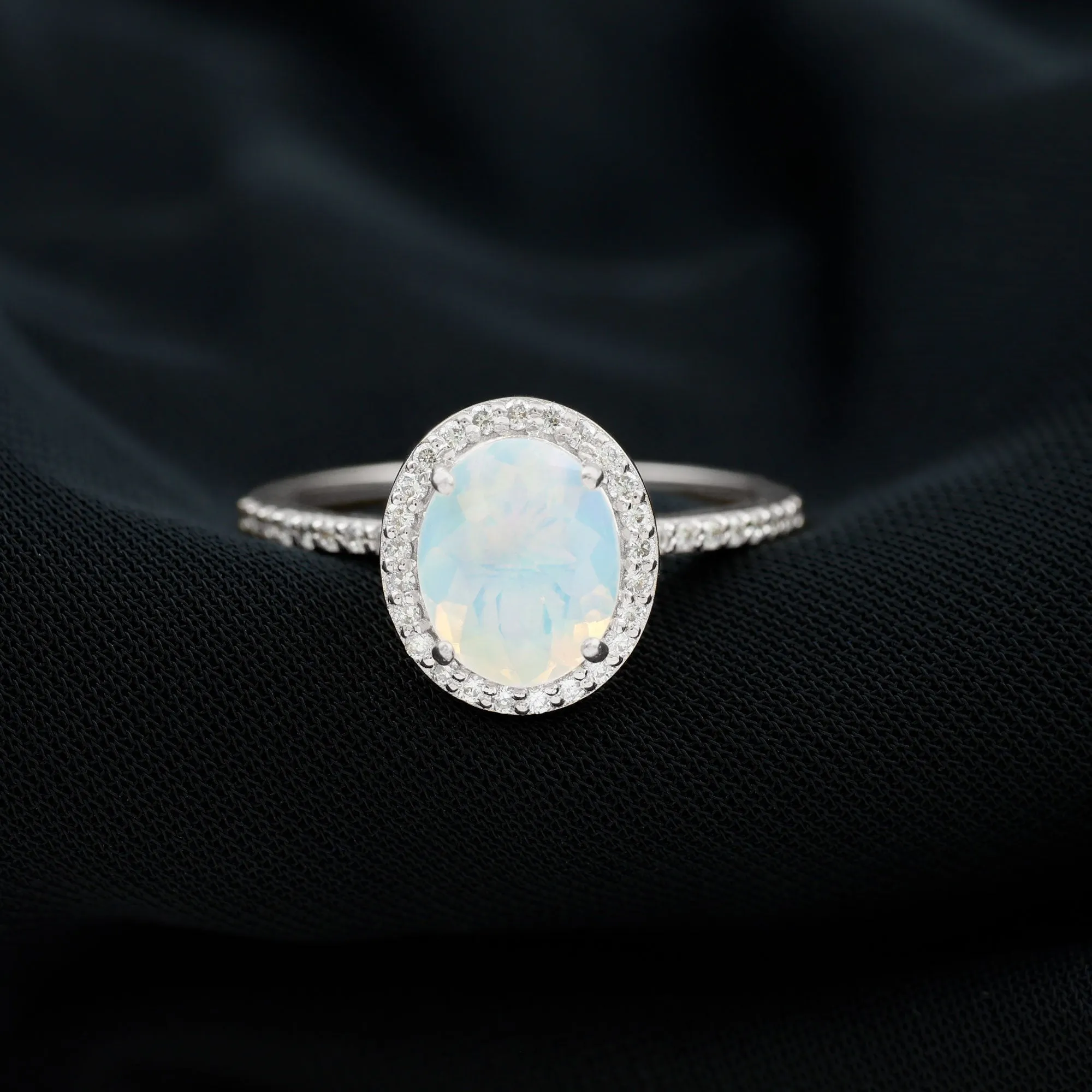 Oval Ethiopian Opal and Diamond Classic Halo Engagement Ring