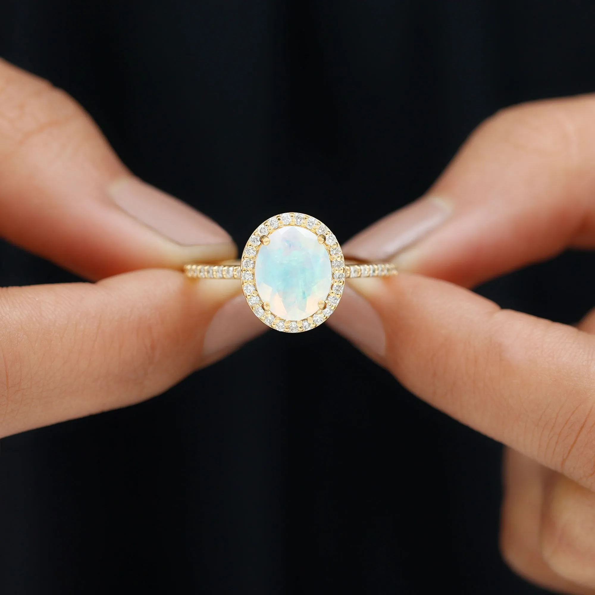 Oval Ethiopian Opal and Diamond Classic Halo Engagement Ring