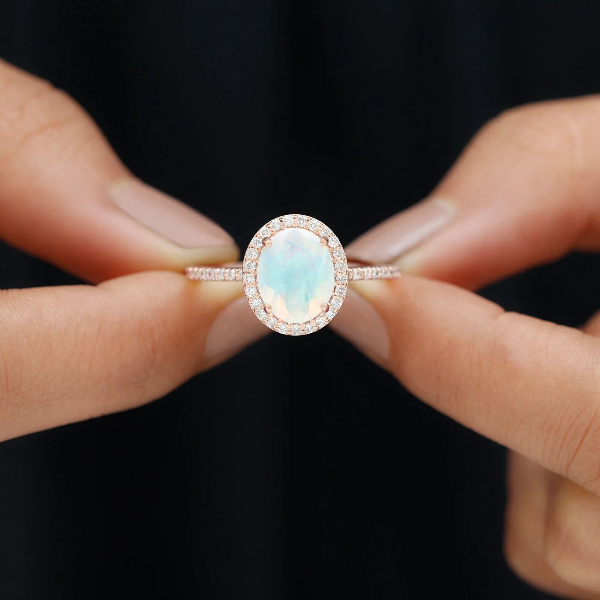 Oval Ethiopian Opal and Diamond Classic Halo Engagement Ring