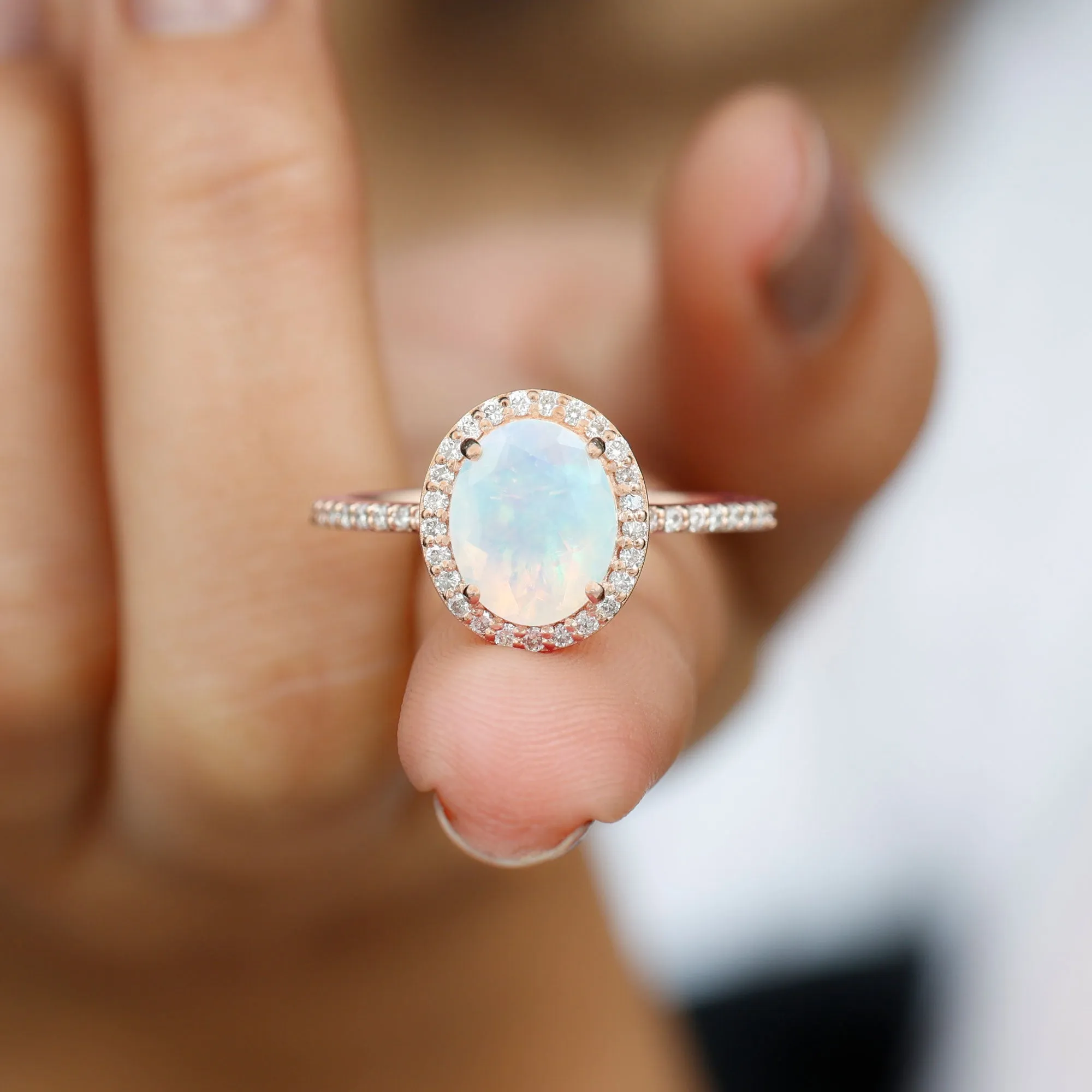 Oval Ethiopian Opal and Diamond Classic Halo Engagement Ring