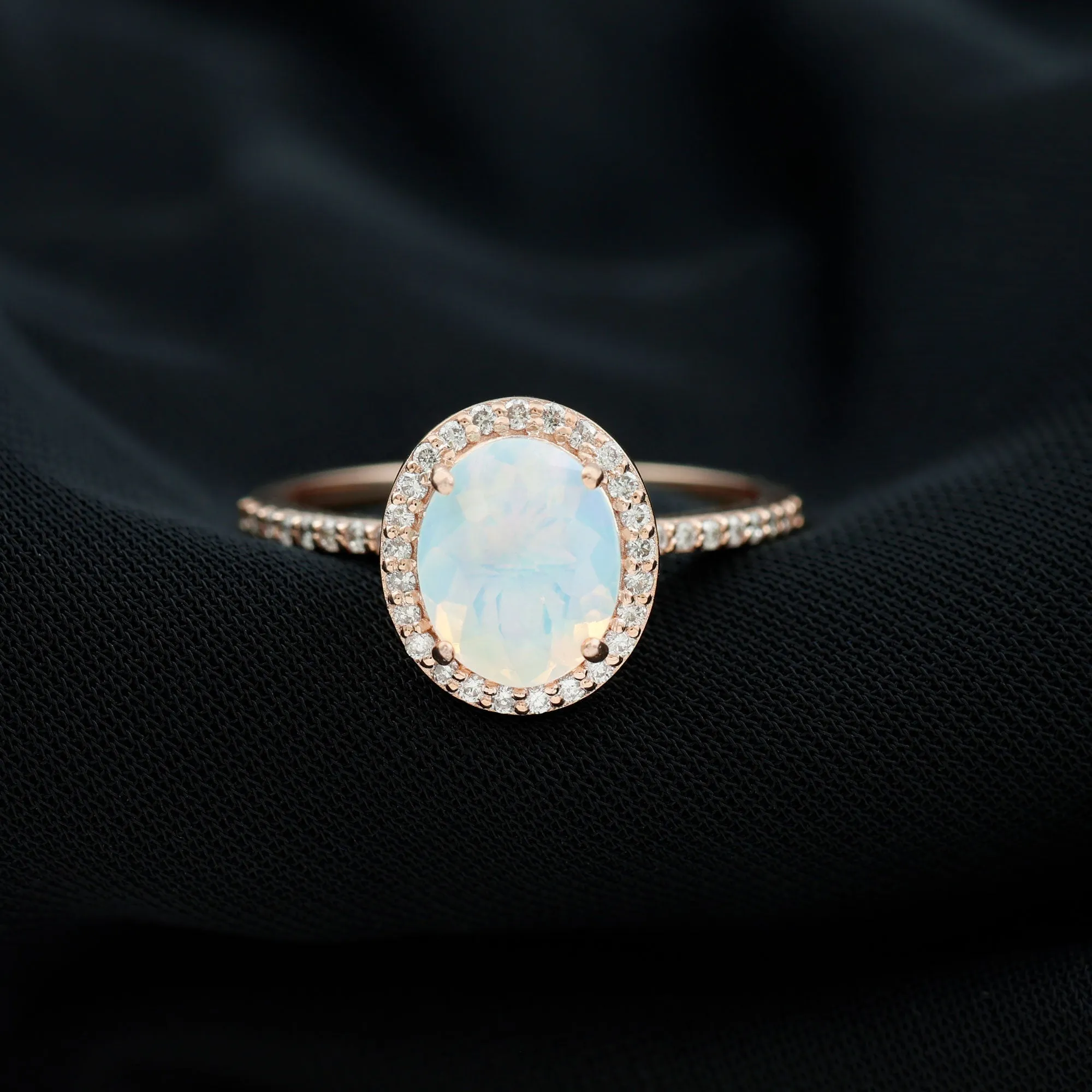 Oval Ethiopian Opal and Diamond Classic Halo Engagement Ring