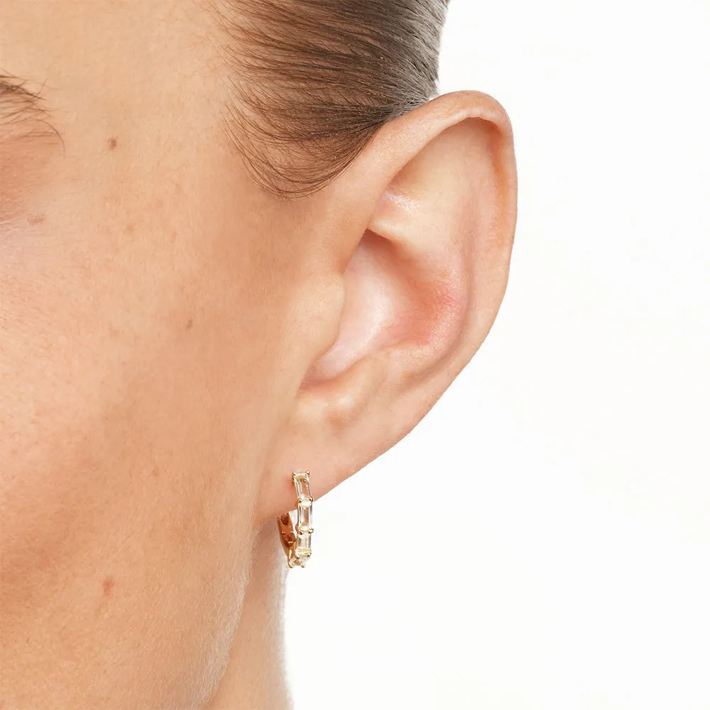 White Topaz Baguette Huggie Earrings in Gold