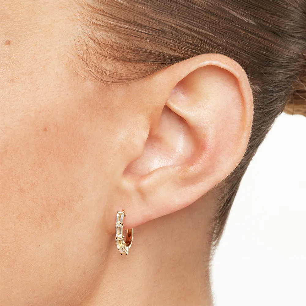 White Topaz Baguette Huggie Earrings in Gold